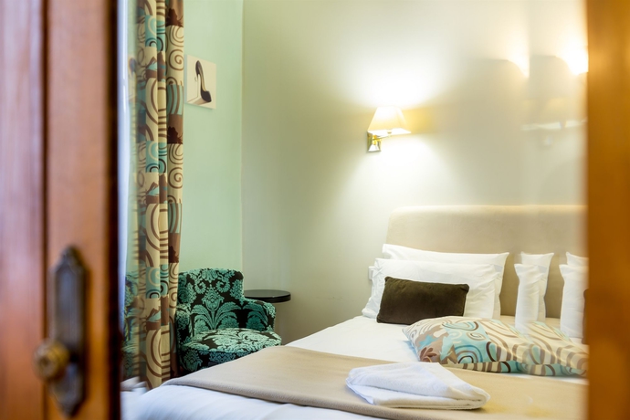 Imagen de la habitación del Hotel Raymond 4 Toulouse. Foto 9