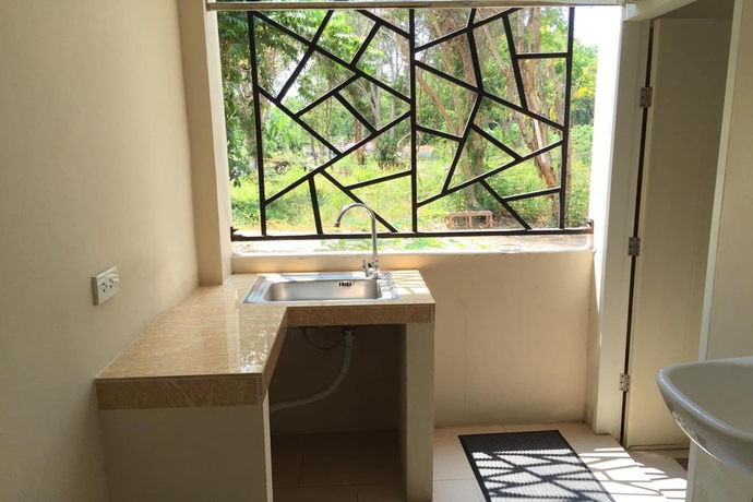 Imagen de la habitación del Hotel Rayonghouse Resort. Foto 9