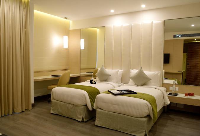 Imagen de la habitación del Hotel Rbd Sarovar Portico. Foto 9