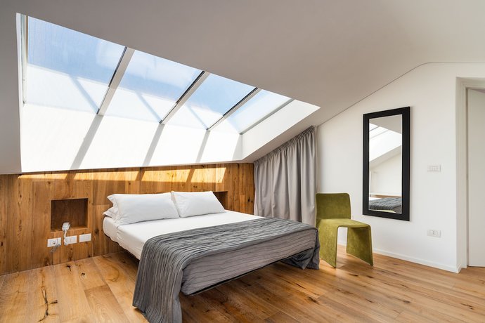 Imagen de la habitación del Hotel Re Dionisio Luxury Suites. Foto 12