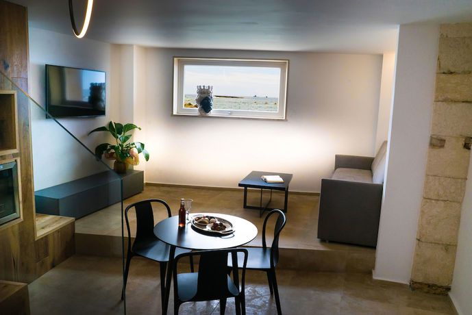 Imagen de la habitación del Hotel Re Dionisio Luxury Suites. Foto 17