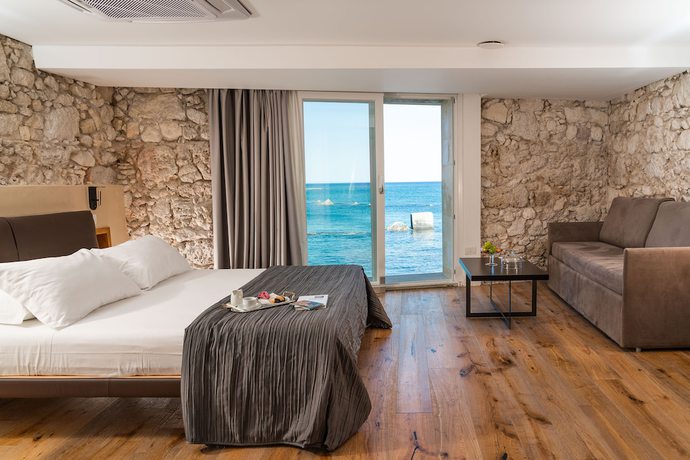 Imagen de la habitación del Hotel Re Dionisio Luxury Suites. Foto 18