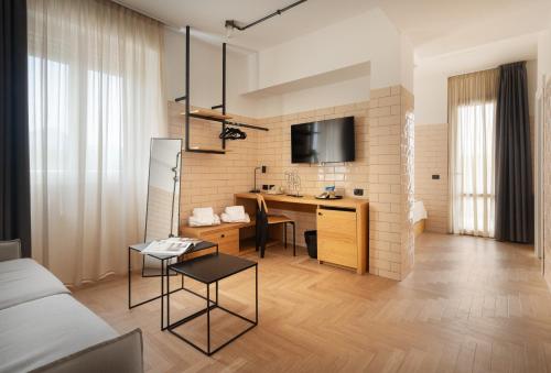 Imagen de la habitación del Hotel Re Versiliana. Foto 14