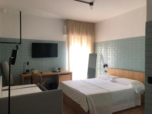 Imagen de la habitación del Hotel Re Versiliana. Foto 18