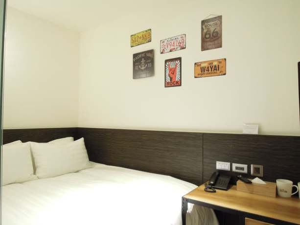 Imagen de la habitación del Hotel Re-Change Hotel Taipei. Foto 10