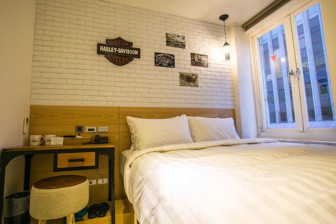 Imagen de la habitación del Hotel Re-Change Hotel Taipei. Foto 11