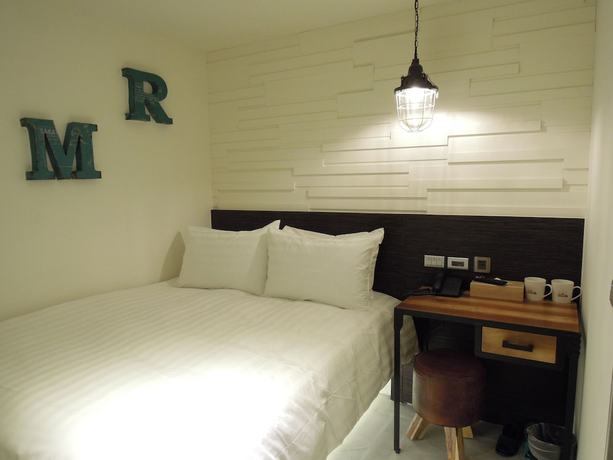 Imagen de la habitación del Hotel Re-Change Hotel Taipei. Foto 12