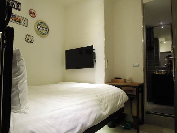 Imagen de la habitación del Hotel Re-Change Hotel Taipei. Foto 14
