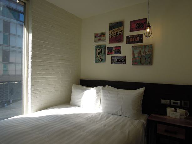 Imagen de la habitación del Hotel Re-Change Hotel Taipei. Foto 15