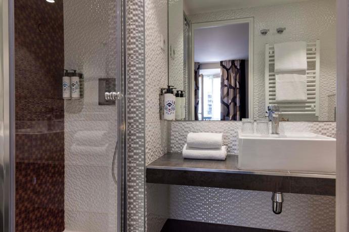 Imagen de la habitación del Hotel Régina Opéra Grands Boulevards. Foto 3