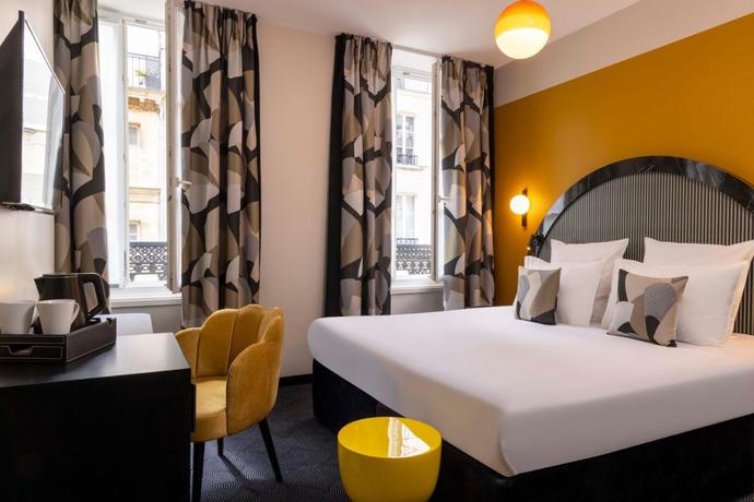 Imagen de la habitación del Hotel Régina Opéra Grands Boulevards. Foto 4