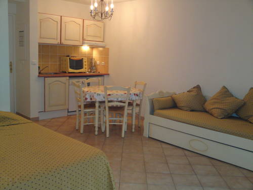 Imagen de la habitación del Hotel Résidence A Barcella. Foto 9