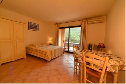 Imagen de la habitación del Hotel Résidence A Barcella. Foto 10