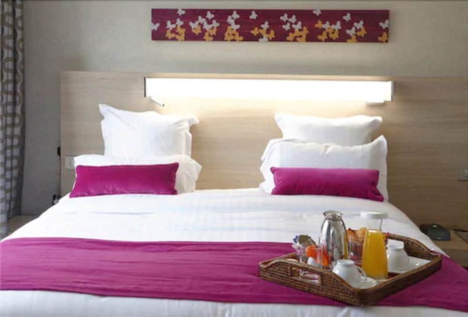 Imagen de la habitación del Hotel R&eacute;sidence Alma Marceau. Foto 3