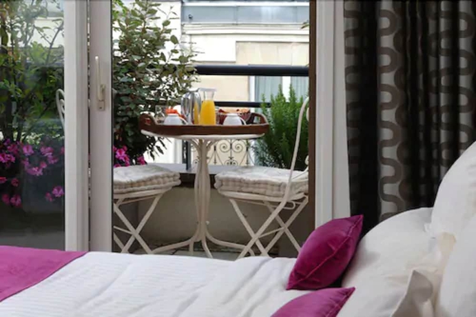 Imagen de la habitación del Hotel R&eacute;sidence Alma Marceau. Foto 4