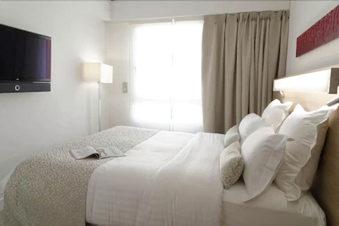 Imagen de la habitación del Hotel R&eacute;sidence Alma Marceau. Foto 12