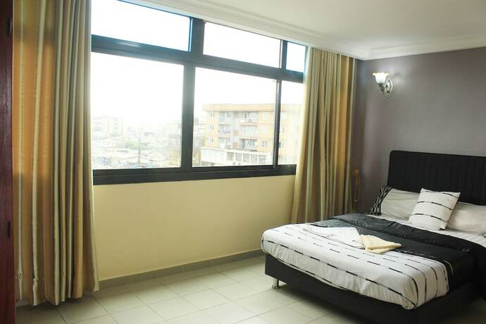 Imagen de la habitación del Hotel R&eacute;sidence Blue Sky, Douala. Foto 22