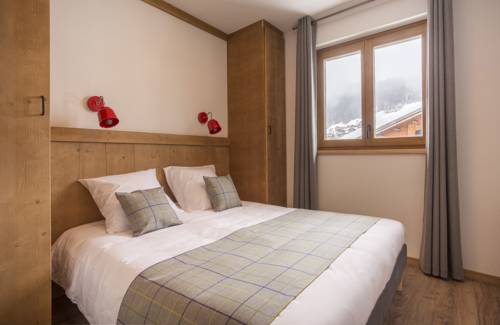 Imagen de la habitación del Hotel R&eacute;sidence Club Mmv La Cl&eacute; Des Cimes. Foto 2