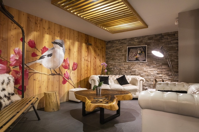 Imagen de los interiores del Hotel Résidence Club Mmv Le Hameau Des Airelles. Foto 19