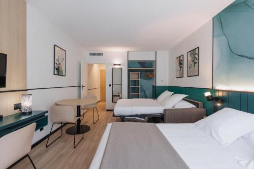 Imagen de la habitación del Hotel R&eacute;sidence Du Parc Val d'Europe. Foto 5