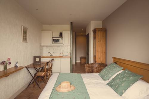 Imagen de la habitación del Hotel Résidence Éco-Domaine La Fontaine. Foto 15