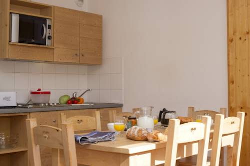 Imagen de la habitación del Hotel R&eacute;sidence Go&eacute;lia Le Balcon Des Neiges. Foto 12