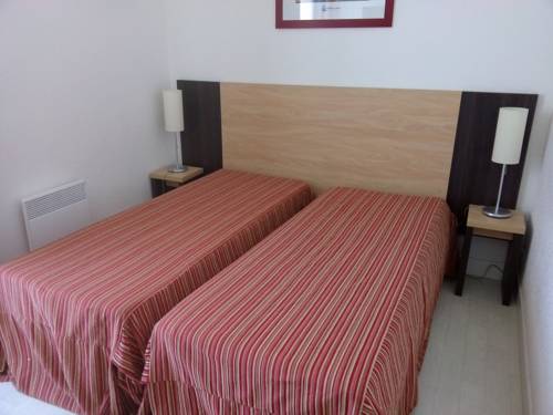 Imagen de la habitación del Hotel R&eacute;sidence Go&eacute;lia Le Grand Bleu. Foto 9