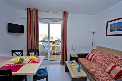 Imagen de la habitación del Hotel R&eacute;sidence Go&eacute;lia Le Grand Bleu. Foto 13