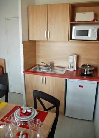 Imagen de la habitación del Hotel R&eacute;sidence Go&eacute;lia Le Grand Bleu. Foto 14