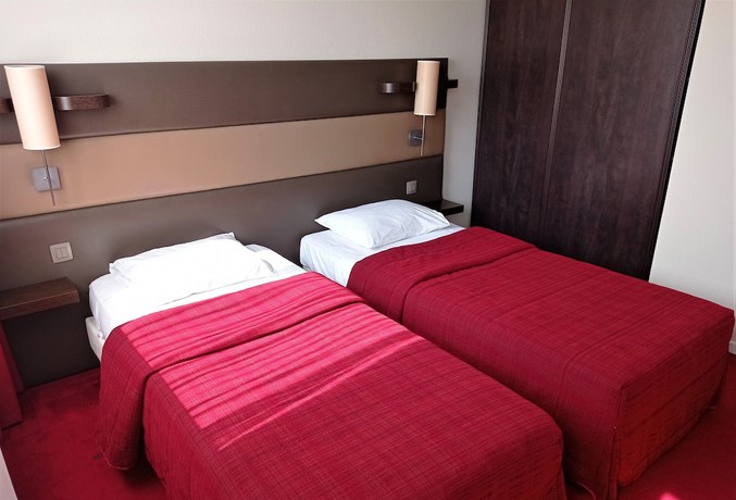 Imagen de la habitación del Hotel R&eacute;sidence H&ocirc;teli&egrave;re des Ondes. Foto 7
