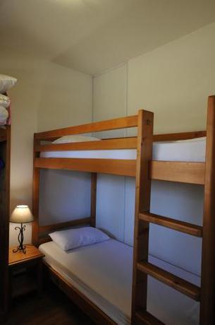 Imagen de la habitación del Hotel R&eacute;sidence Le Bois de la Reine, Besse-et-Saint-Anastaise. Foto 6