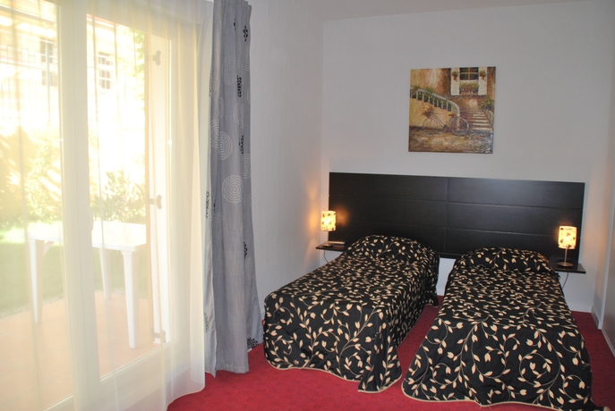 Imagen de la habitación del Hotel R&eacute;sidence Le Virginia By Popinns. Foto 9