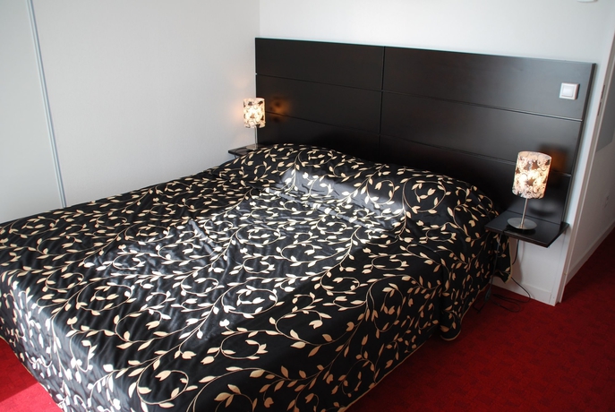 Imagen de la habitación del Hotel R&eacute;sidence Le Virginia By Popinns. Foto 11