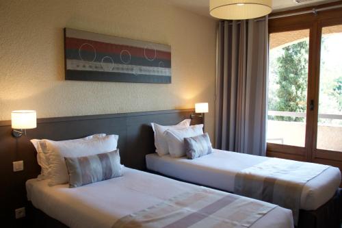 Imagen de la habitación del Hotel Résidence Les 3 Barbus. Foto 8