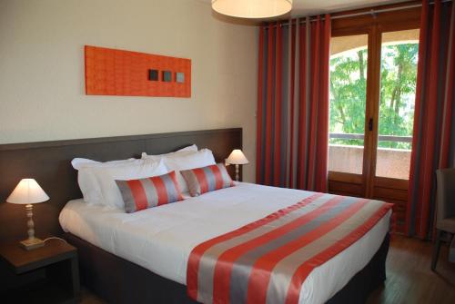 Imagen de la habitación del Hotel Résidence Les 3 Barbus. Foto 9