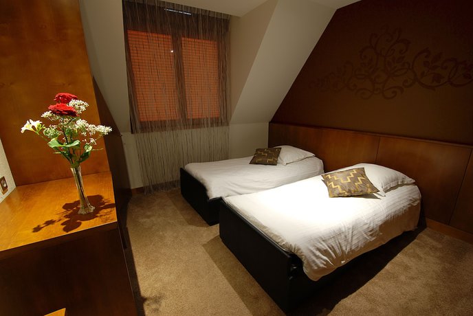 Imagen de la habitación del Hotel Résidence Les Cigogneaux. Foto 2