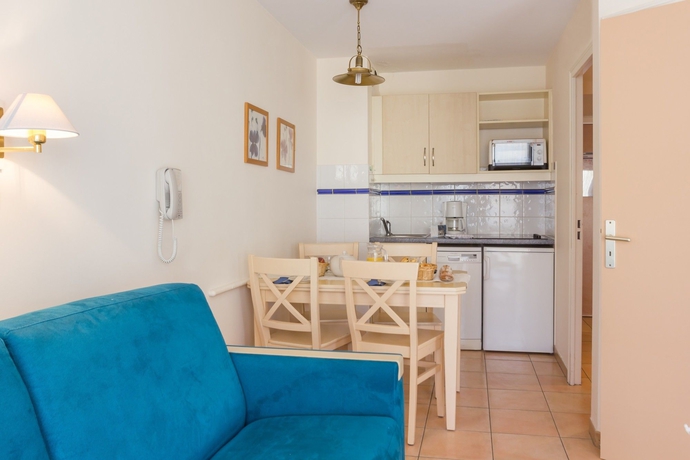 Imagen de los interiores del Hotel Résidence Les Rivages Du Parc Pierre and Vacances. Foto 12