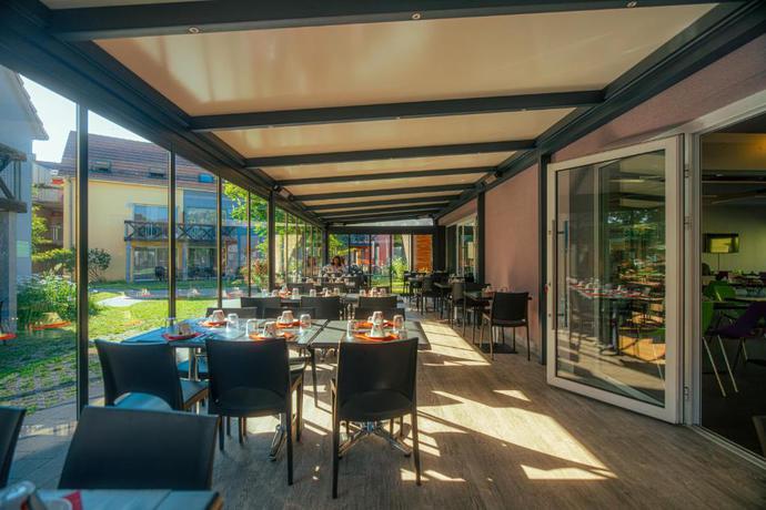 Imagen del bar/restaurante del Hotel R&eacute;sidence Les Rives De La Fecht. Foto 2