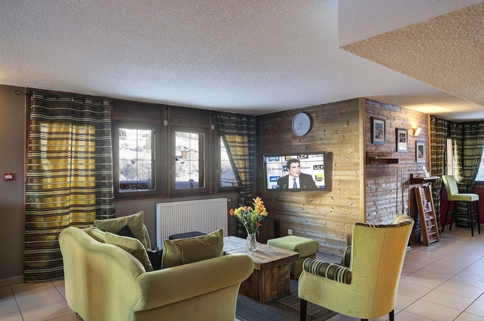 Imagen del bar/restaurante del Hotel Résidence Nemea Les Chalets Des Evettes. Foto 3