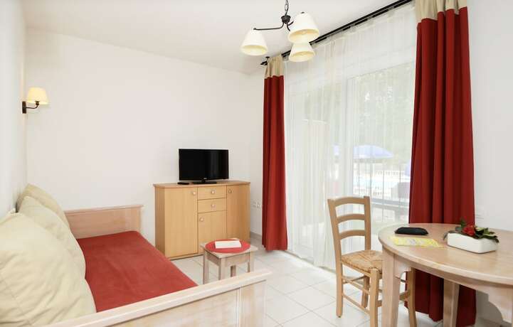 Imagen de la habitación del Hotel R&eacute;sidence Odalys Le Hameau du Lac. Foto 19