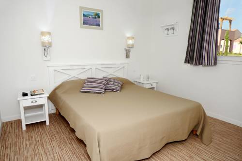 Imagen de la habitación del Hotel R&eacute;sidence Odalys Le Mas Des Alpilles. Foto 7