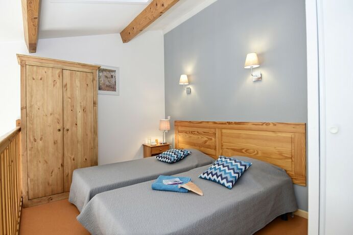 Imagen de la habitación del Hotel R&eacute;sidence Odalys Le Mas Des Vignes. Foto 17