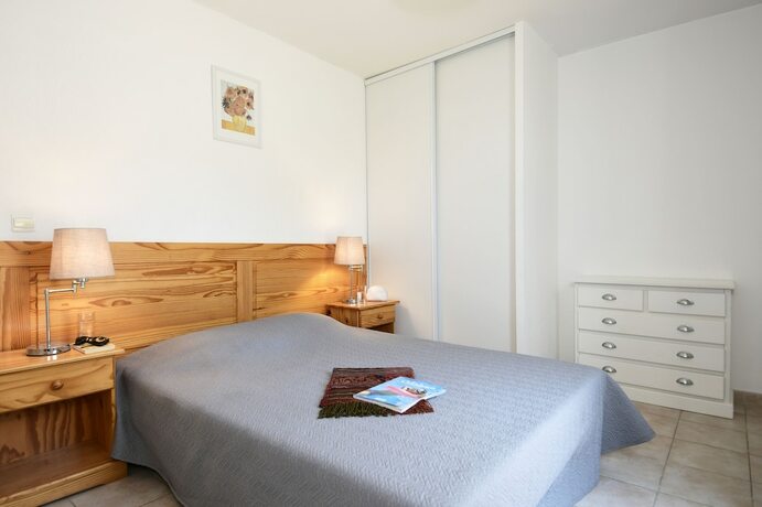 Imagen de la habitación del Hotel R&eacute;sidence Odalys Le Mas Des Vignes. Foto 20