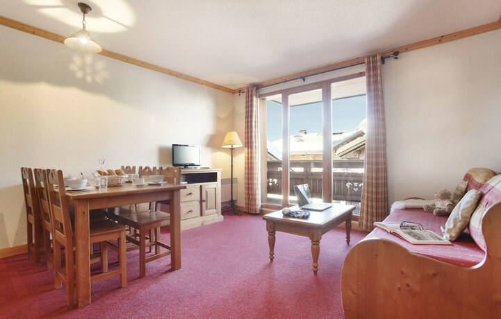 Imagen de la habitación del Hotel Résidence Odalys Le Village. Foto 17