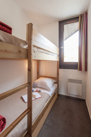 Imagen de la habitación del Hotel Résidence Pierre and Vacances Les Menuires Les Combes. Foto 4