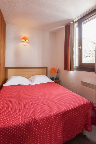 Imagen de la habitación del Hotel Résidence Pierre and Vacances Les Menuires Les Combes. Foto 9