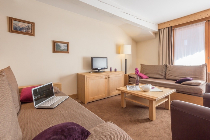 Imagen de los interiores del Hotel Résidence Pierre and Vacances Premium Les Chalets Du Forum. Foto 9