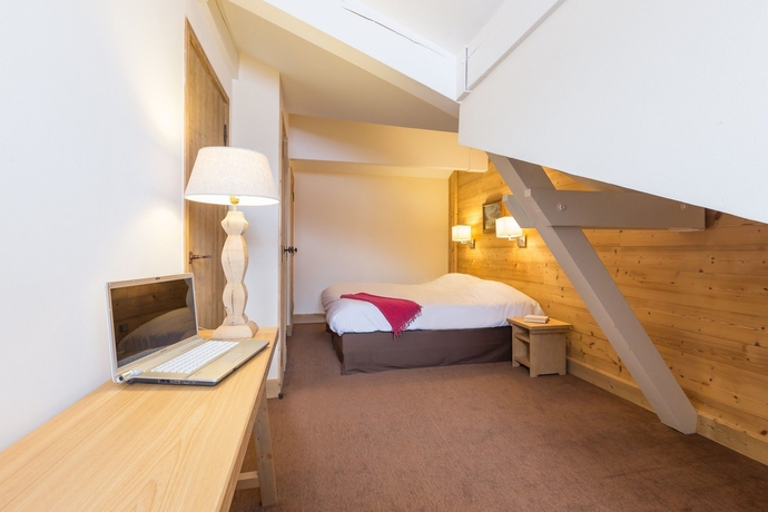 Imagen de la habitación del Hotel Résidence Pierre and Vacances Premium Les Chalets Du Forum. Foto 5