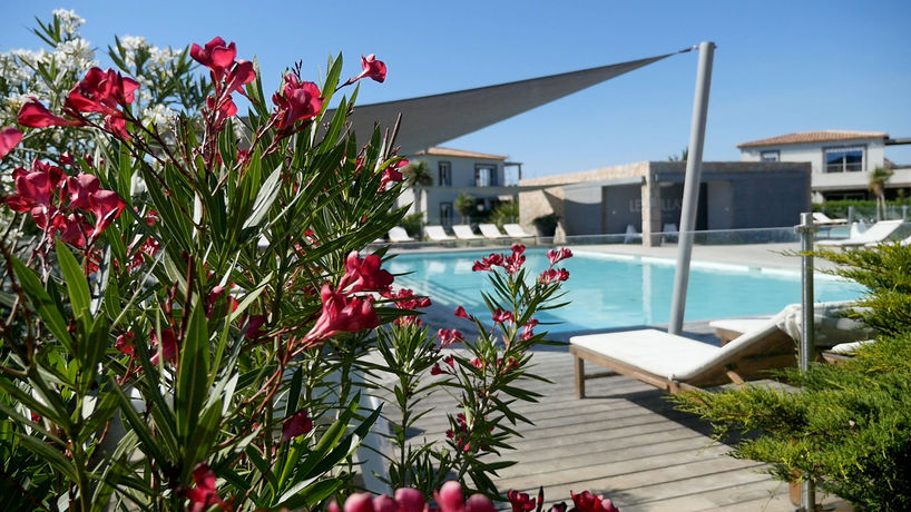 Imagen de la piscina del Hotel R&eacute;sidence Premium Les Villasportovecchio. Foto 11