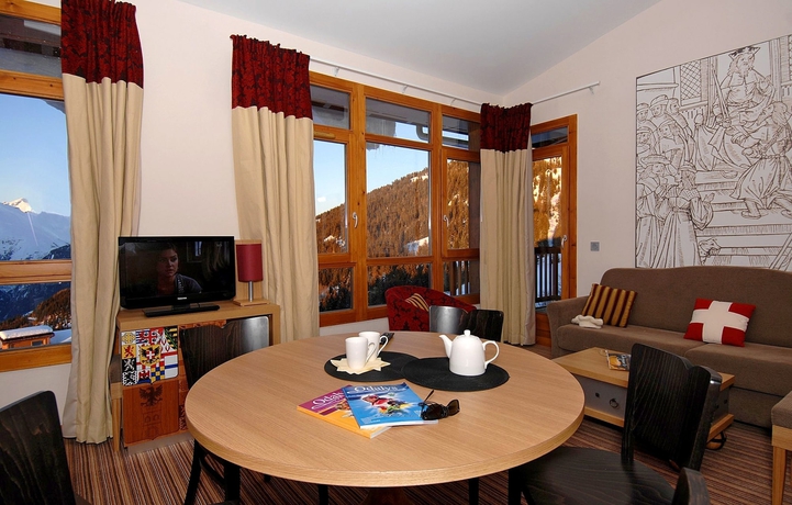 Imagen de los interiores del Hotel Résidence Prestige Odalys Edenarc - Arc 1800. Foto 15